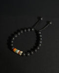 The Barrel Bracelet handcrafted with 8mm Picasso jasper wheel beads and lava stone, adjustable natural stone bracelet.