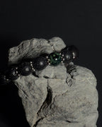Handmade adjustable Wildstone bracelet featuring natural Kambaba jasper with lava stone, black tourmaline and stainless steel sunburst spacers.